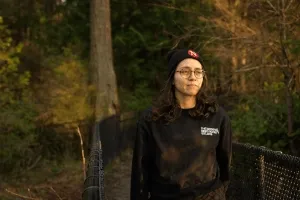 A GIF of several employees at The Narwhal wearing Narwhal toques.